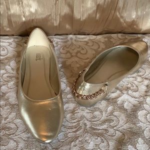 Gold ballet flats with back chain